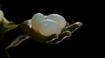 Green Tara holds eggs in LIQUID TARA